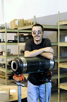 Skilled craftsman Albert Ruck with the Pressure Vessel he welded to successfully earn EPIC's R-Stamp and U-Stamp certifications.