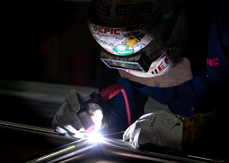 This welder is conducting a TIG weld during skid fabrication